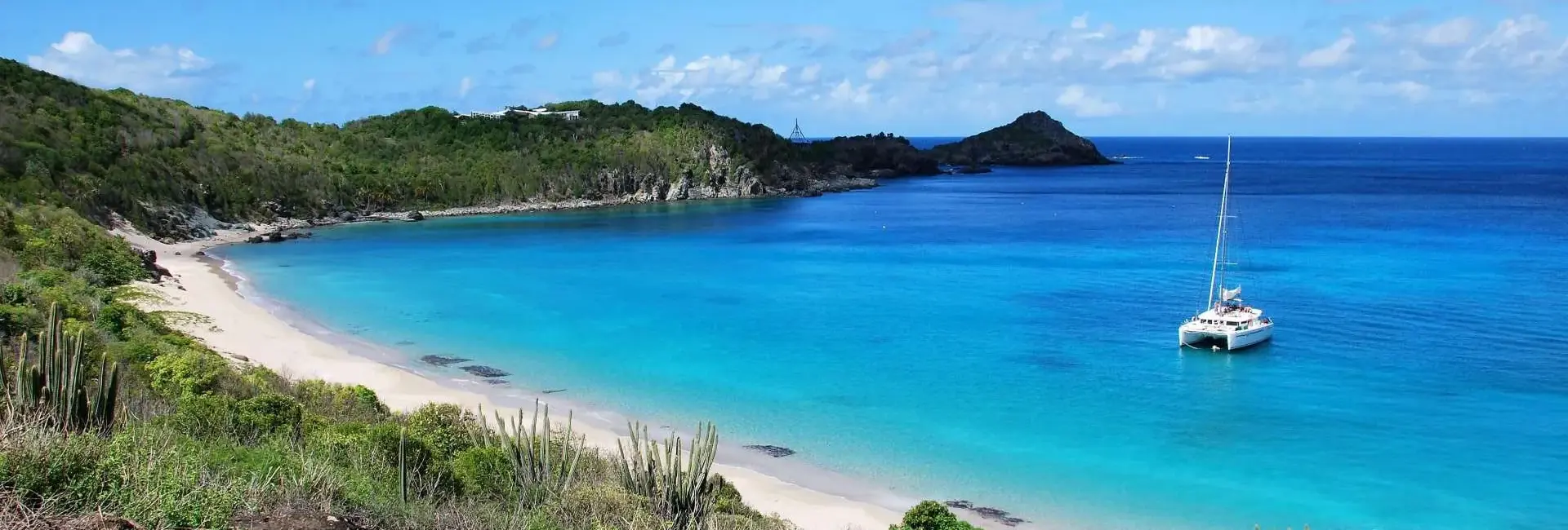 Paradise beaches of St Barth at Christmas, golden sand and turquoise waters, in one of the best Christmas vacation destinations.
