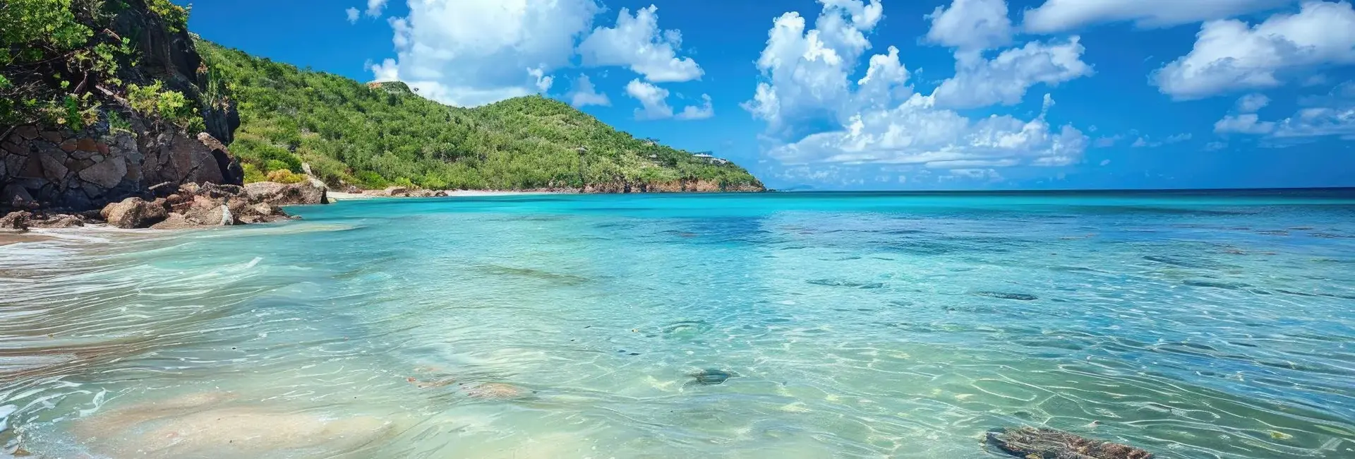 Untouched beach in St. Barts at sunset, highlighting the island as one of the best places to vacation for Thanksgiving.