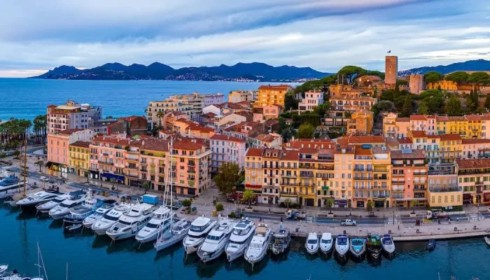 Luxury Yacht for the Cannes Film Festival with night view of Le Suquet and Old Cannes