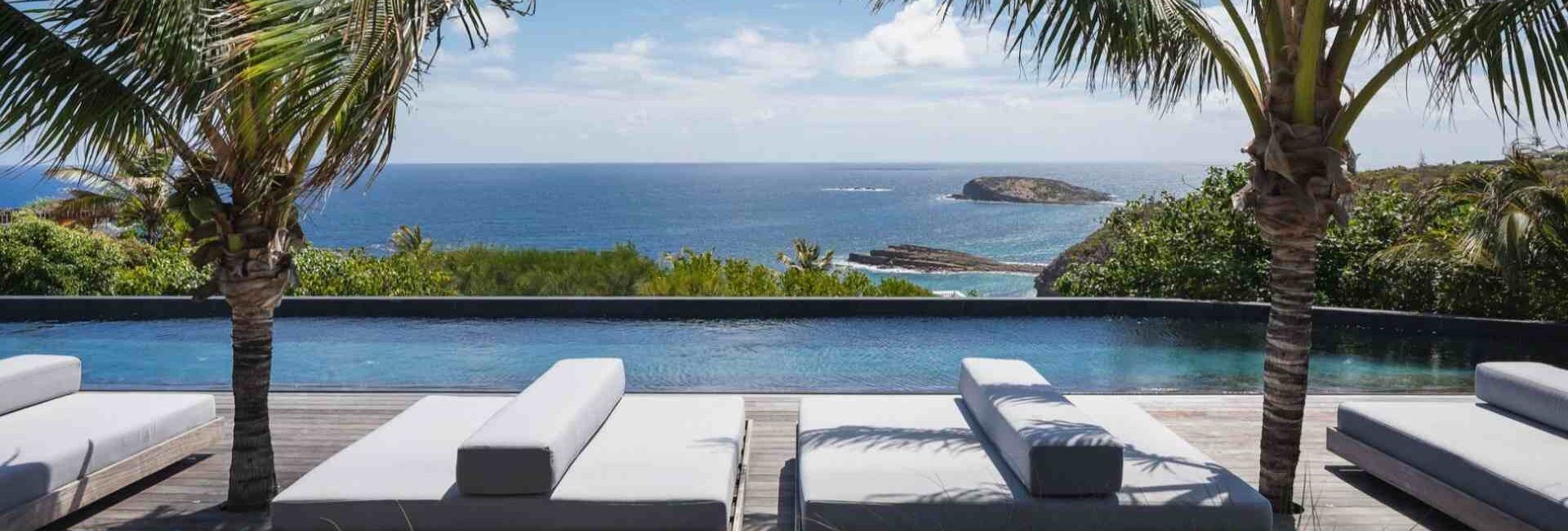 Breathtaking view of Pointe Milou in St Barths from the terrace of your private villa