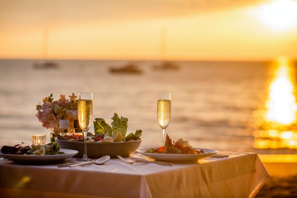 Gourmet sunset dinner on the terrace of a luxury villa in Saint-Barth