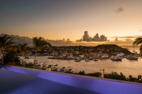 Villa Embrace in Gustavia, contemporary luxury villa with sunset views and illuminated harbour